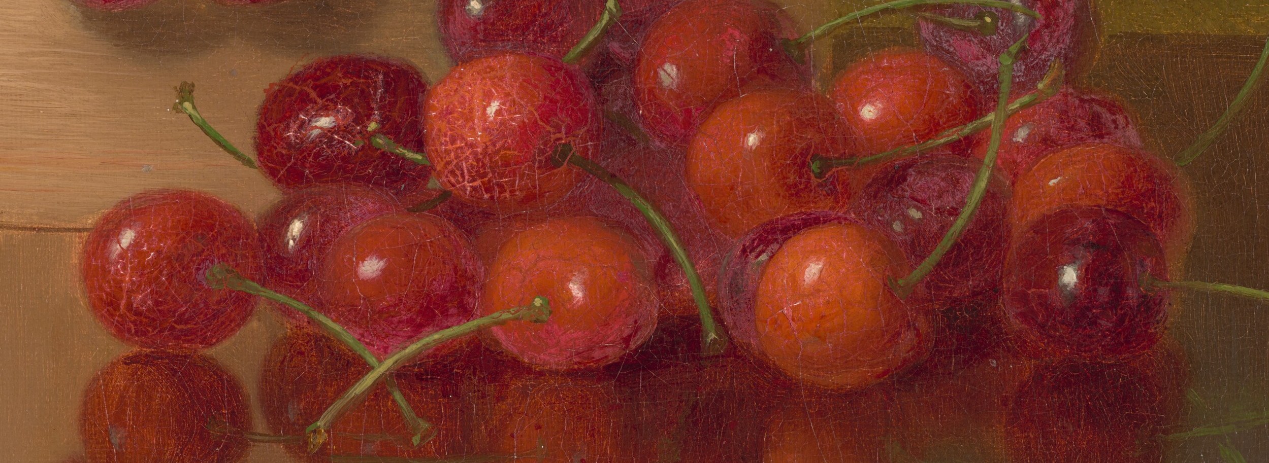 Look closely at the cherries scattered on the table.