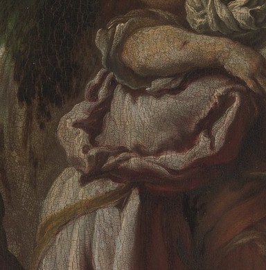 His hands hold the reins with a quiet, weary care.