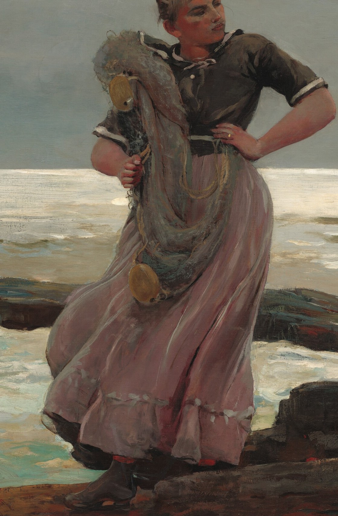 A woman in a pink dress grips her fishing nets.