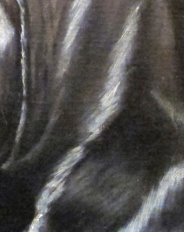 The sharp folds show El Greco's brushwork.