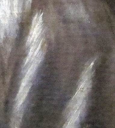 El Greco uses stark light on the hood.