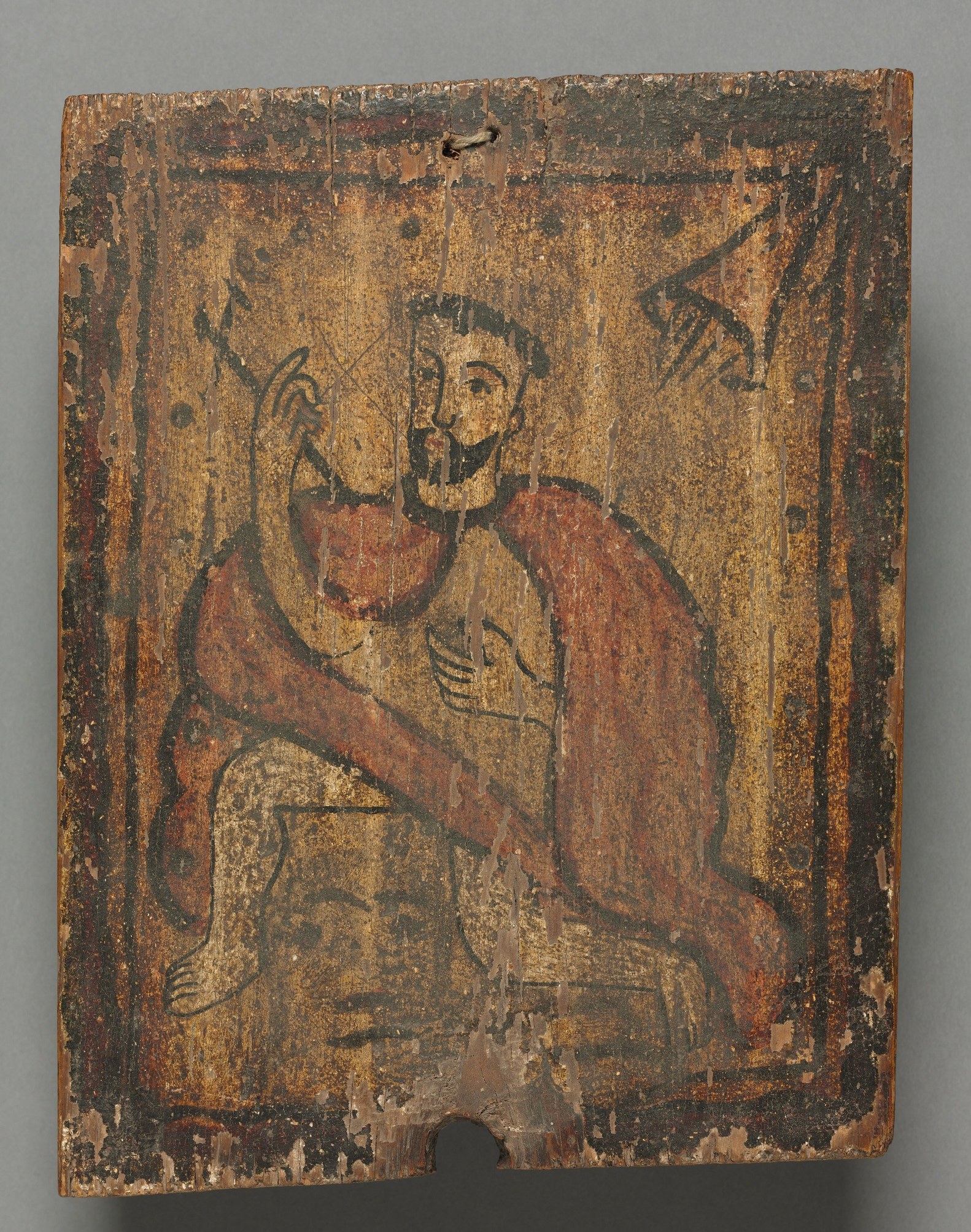 The golden background creates a sacred space around him.