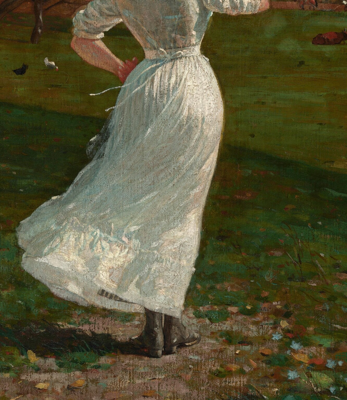 Her dress is wind-swept. The horn is catching the light.