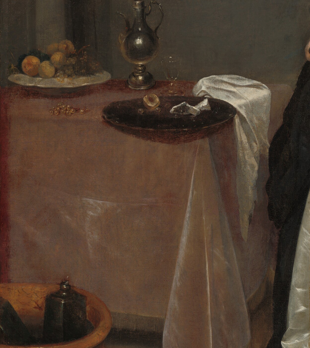 The still life on the table also hints at her refined life.