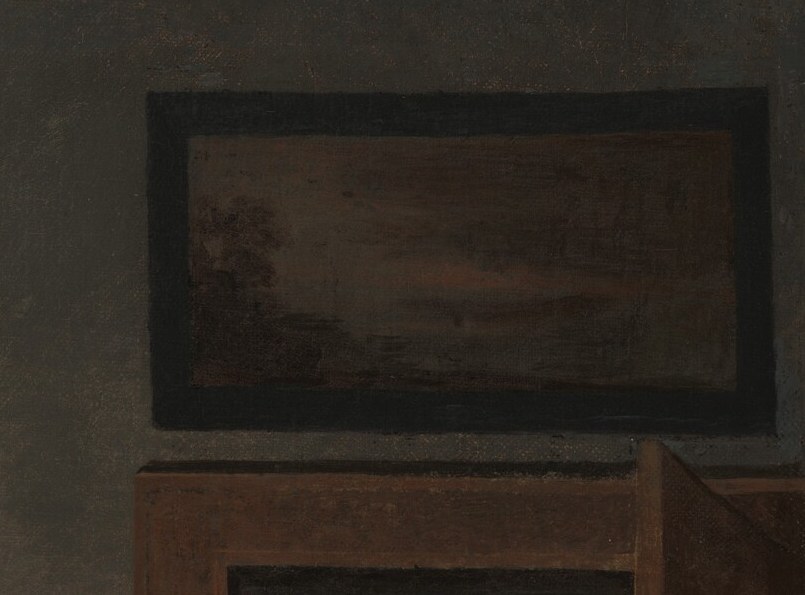 But look closely at the wall, past her shoulder.