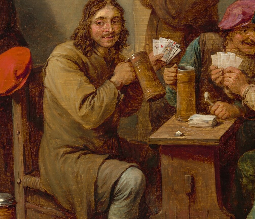 Here, a man finds simple joy in a raised beer mug.