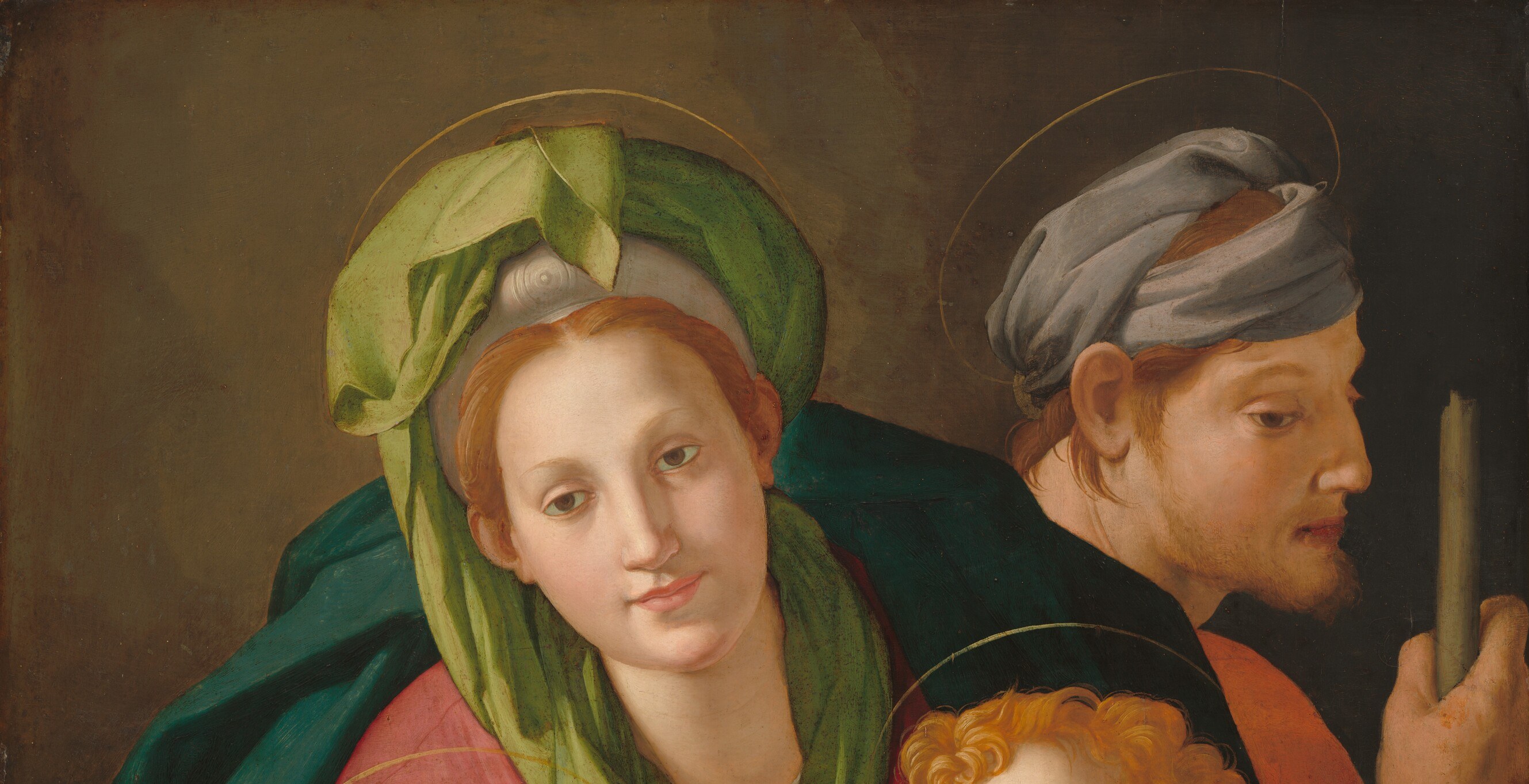 Bronzino uses a flat, dark ground with no landscape or architectural detail , an early Mannerist device that collapses depth and forces all attention onto the figures' surfaces.