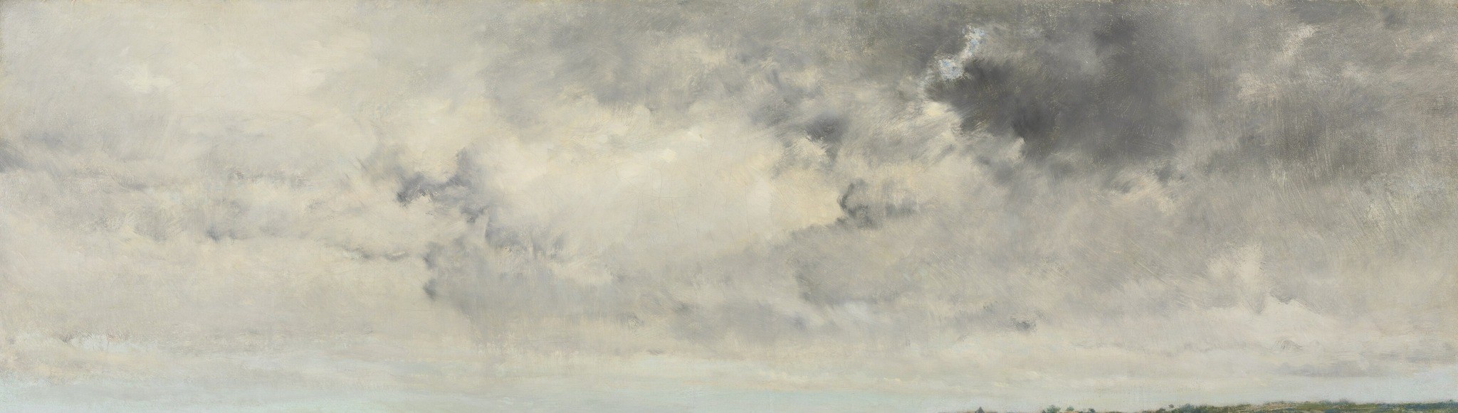 The moody, cloud-filled sky dominates the upper portion, conveying a sense of atmosphere and perhaps a coming change in weather.