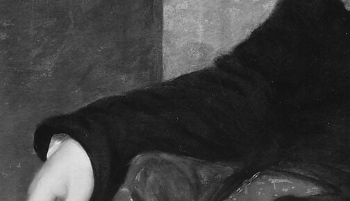 His hand rests on the very document. The work is paused, not posed.