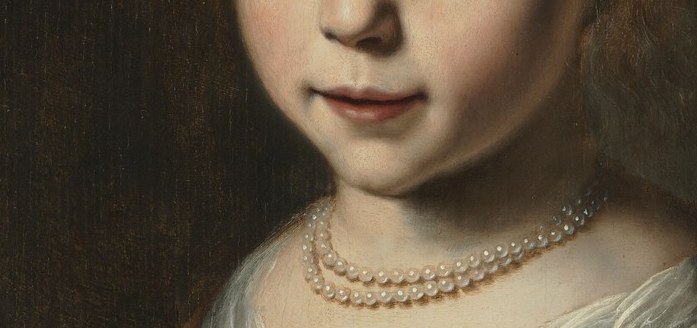 She wears pearls and fine lace, a symbol of her family's wealth.