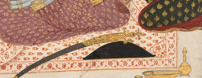 The sword signifies the Maharaja's power and status, yet its placement on the floor suggests a relaxed or domestic setting.