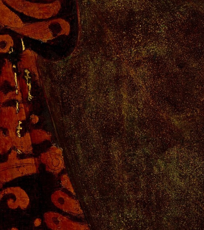 Notice the rich, swirling pattern on his red robe.