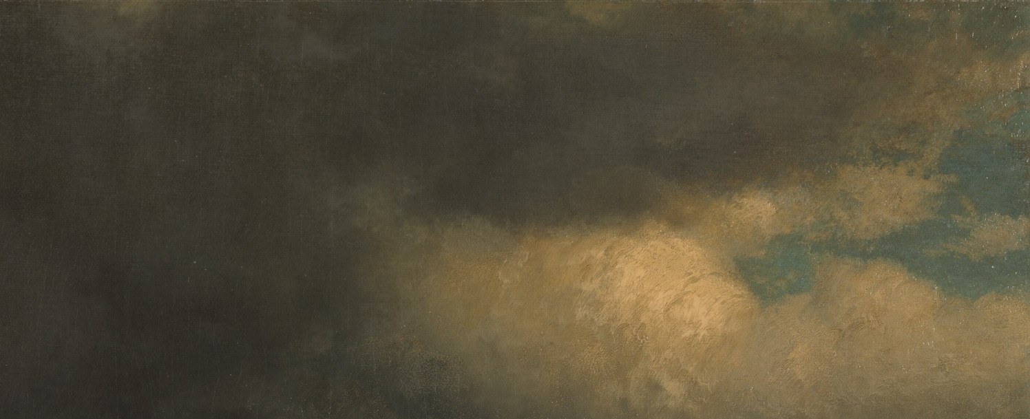 Light breaks through the stormy, luminous sky.