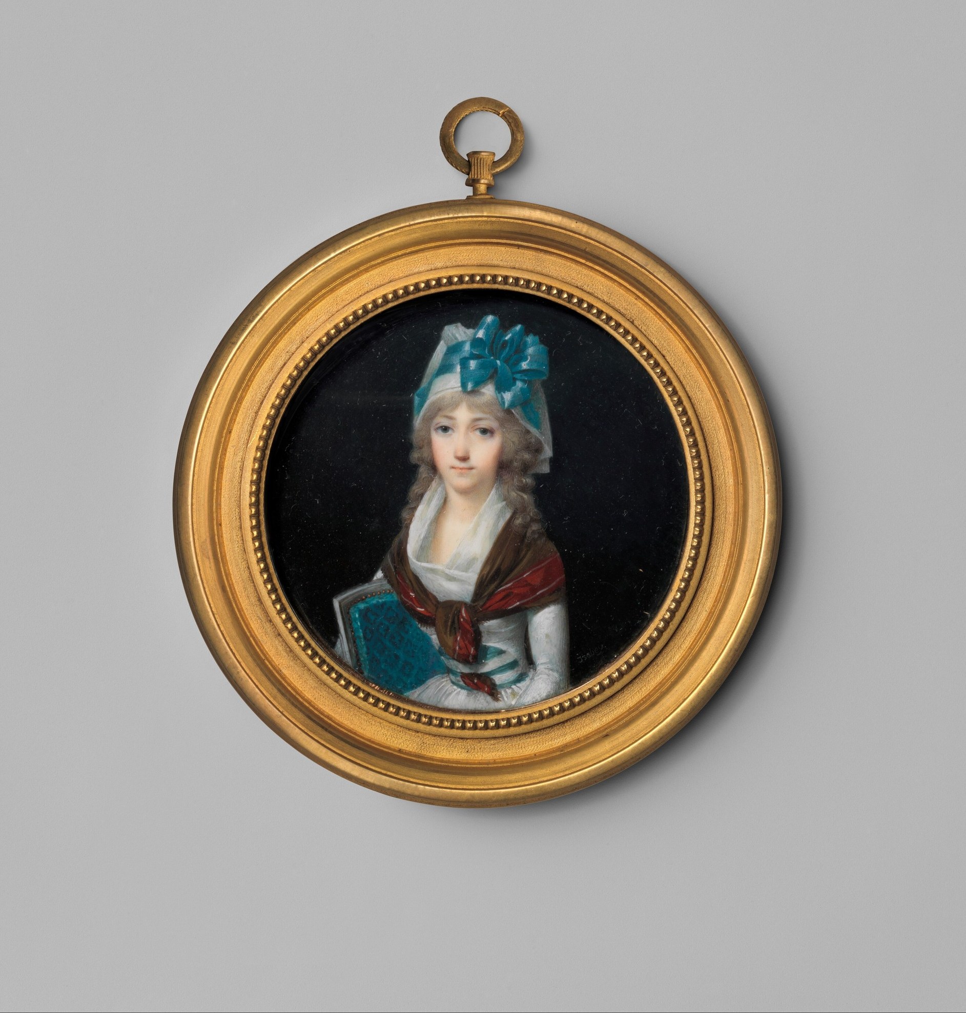 The broad gold frame identifies this as a wearable or giftable locket object, not a wall portrait; the scale and format encode an intimate social function