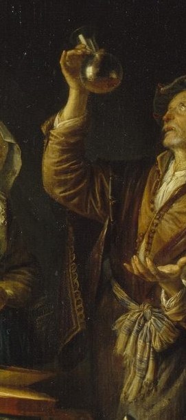 The physician carefully examines a glass vial.