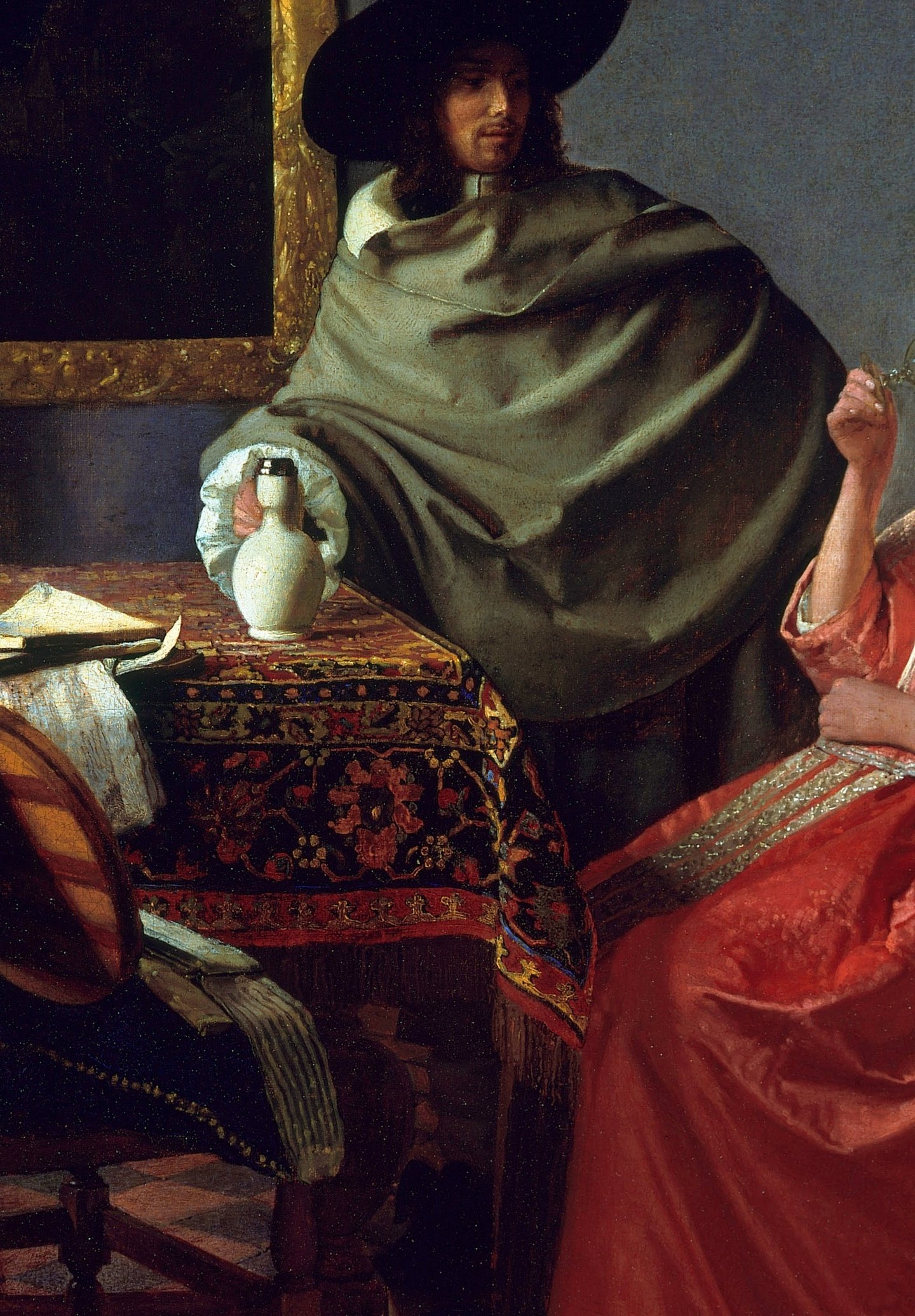 Her companion offers her wine.