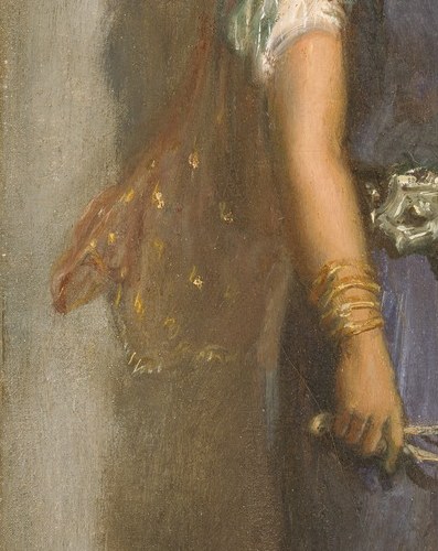 Look at the rope in her hand.