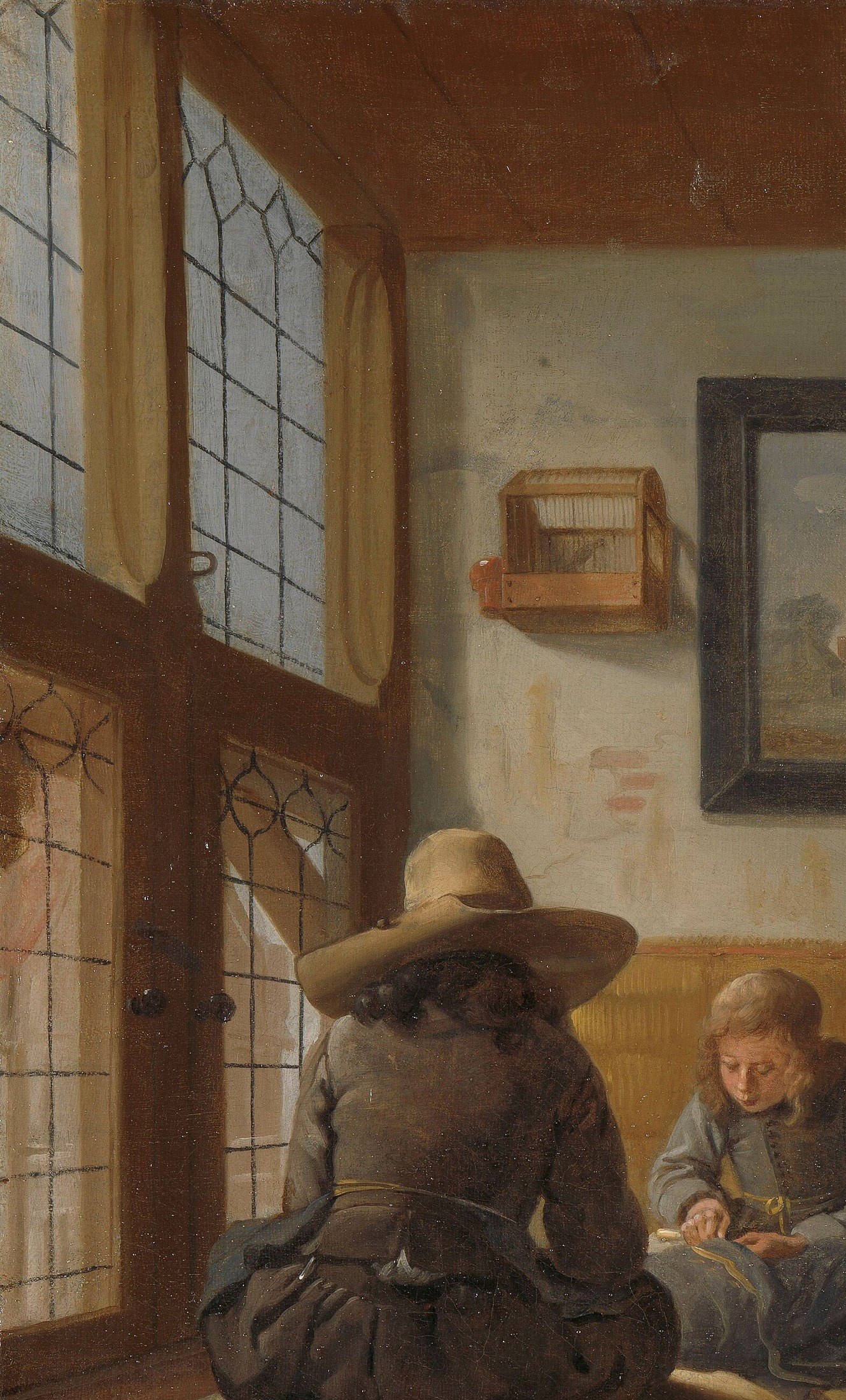 The light falls on his focused work.