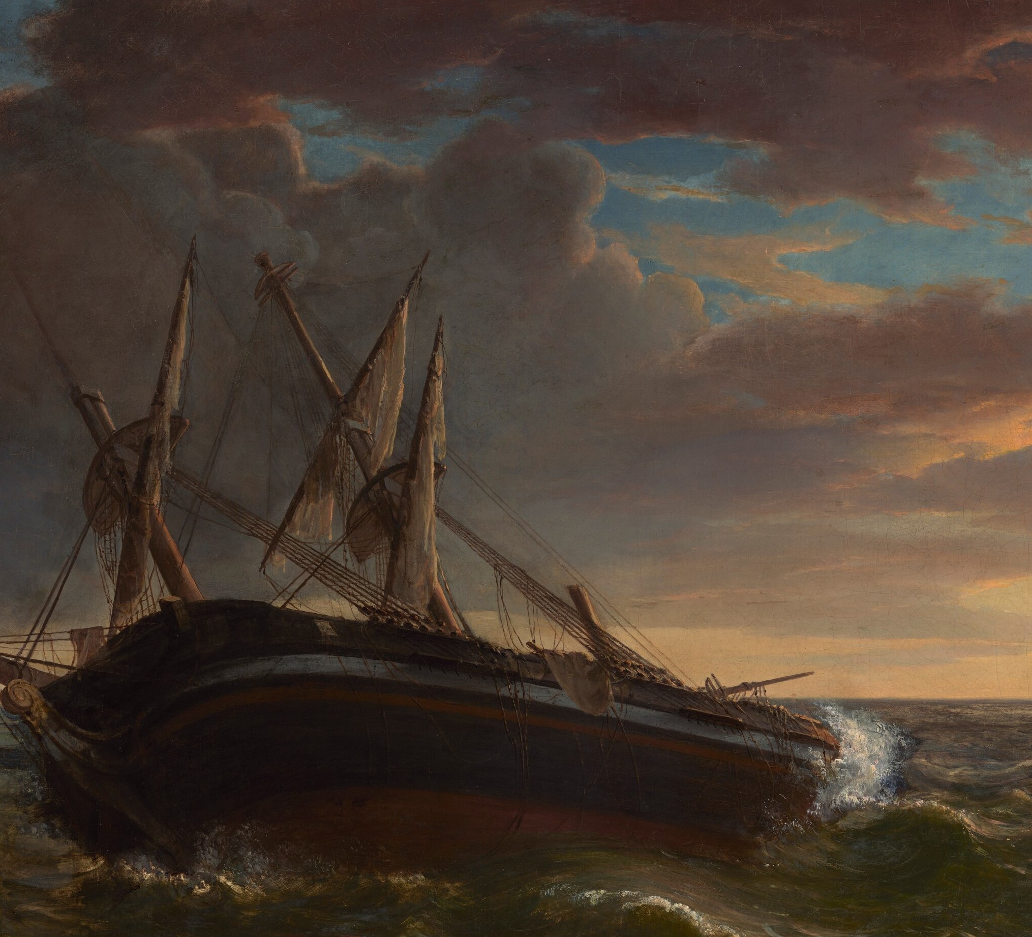The dominant subject , its severe list and exposed hull communicate catastrophe without showing the moment of impact; the tilt angle tells the whole story.