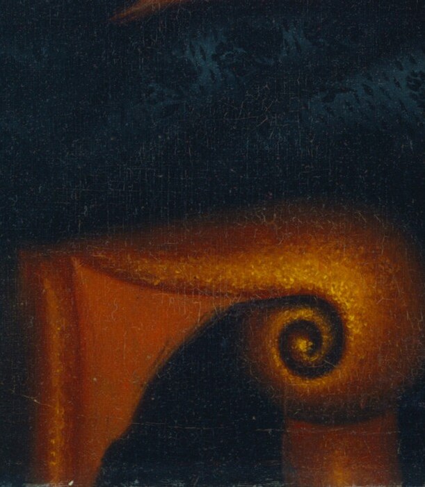 Even the chair is carved with an elegant swirl.