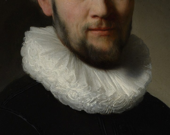 The intricate folds and delicate texture of the lace collar are a testament to the artist's skill.