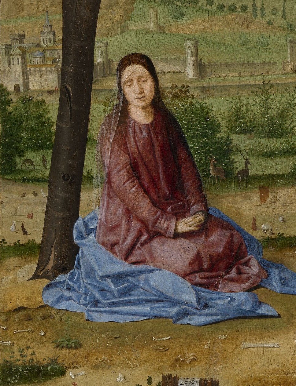 Her contemplative pose and downcast eyes express profound grief and devotion.
