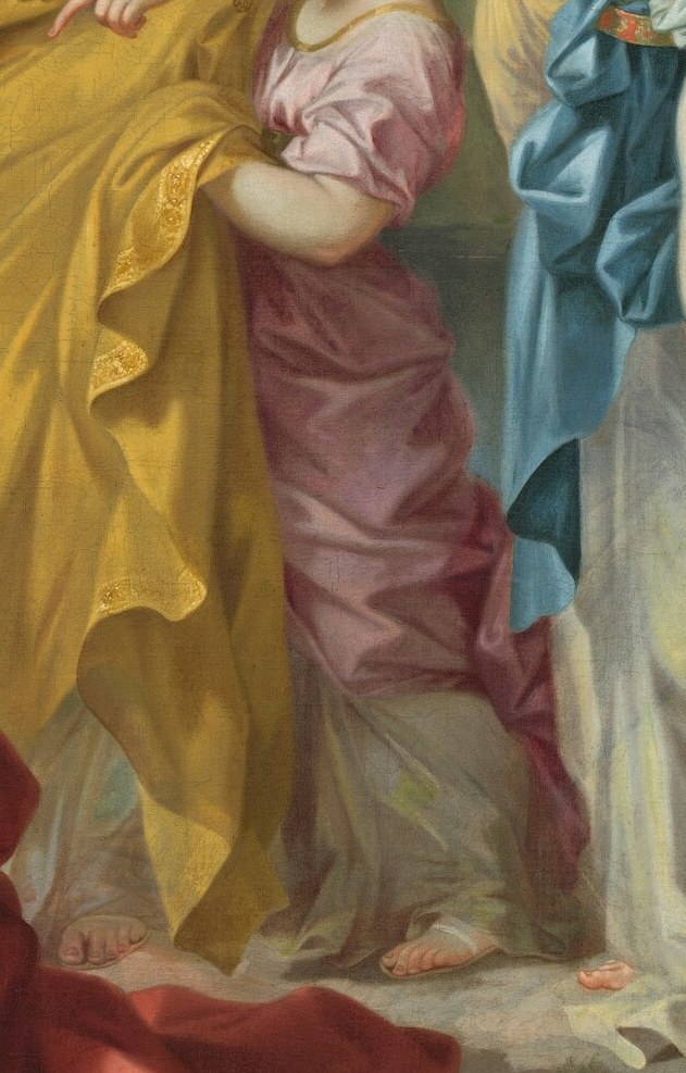 A woman kneels, gently presenting the child to her.