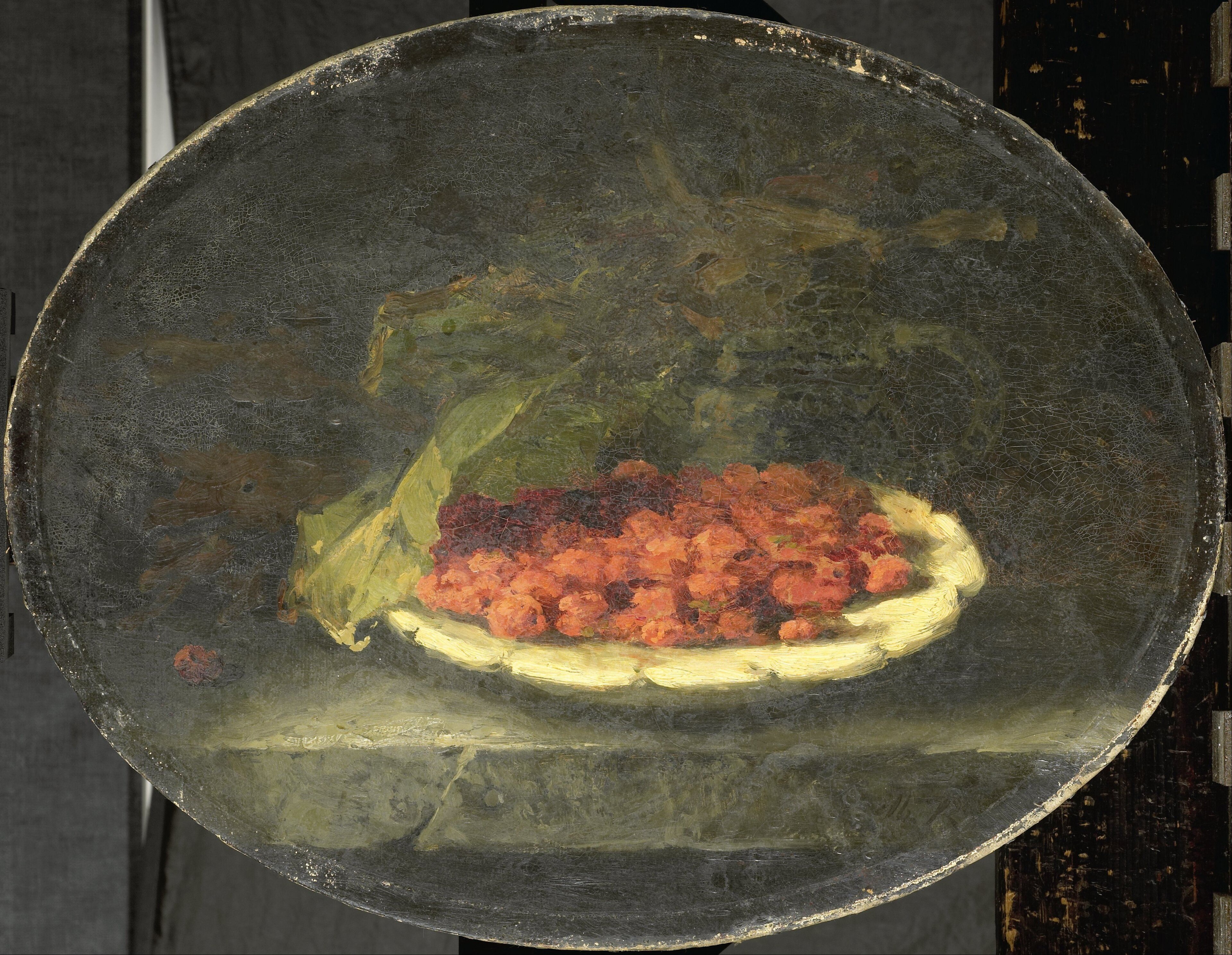 The deep, almost black background isolates the subject, intensifying the focus on the fruit and bowl and creating a sense of intimacy.