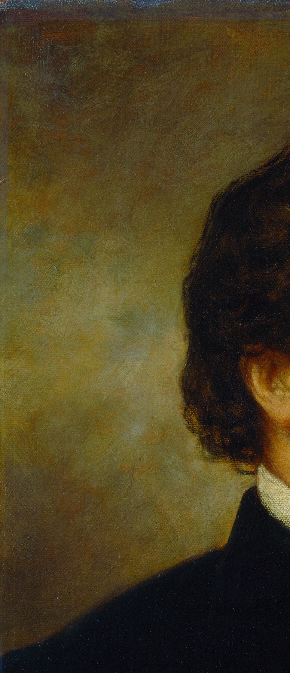 The artist subtly frames him, alone, against an ambiguous background.