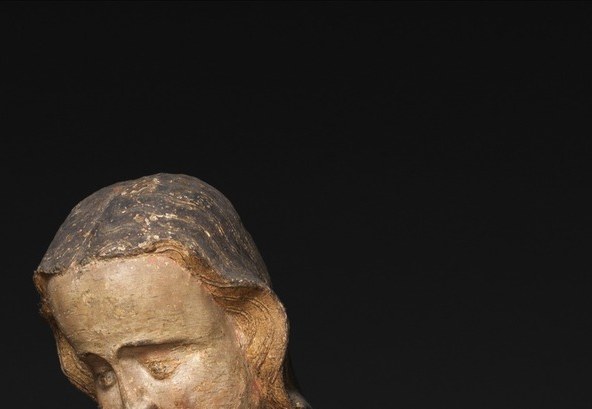 The gold on her head is not a crown of grief.