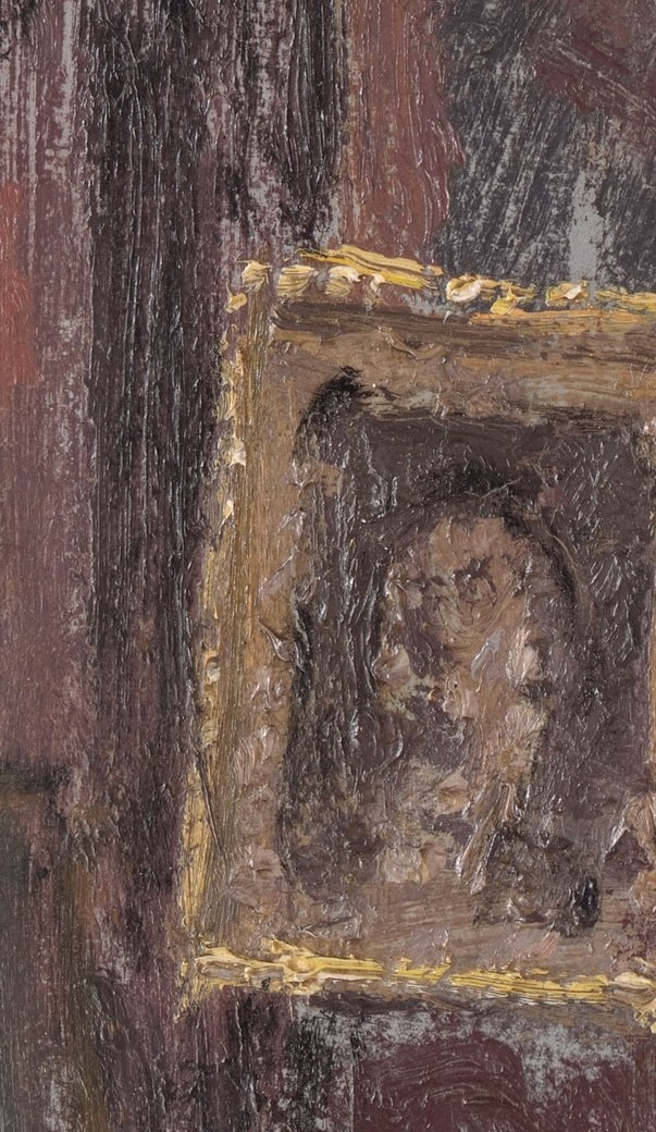 Look closely at the wall, just above the chests.
