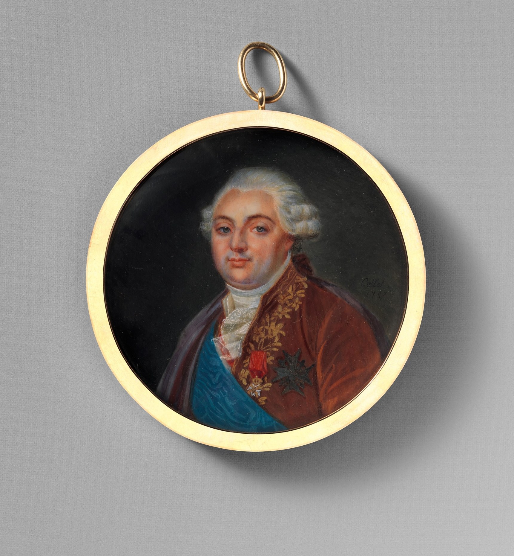 This small portrait was designed to be held or worn.