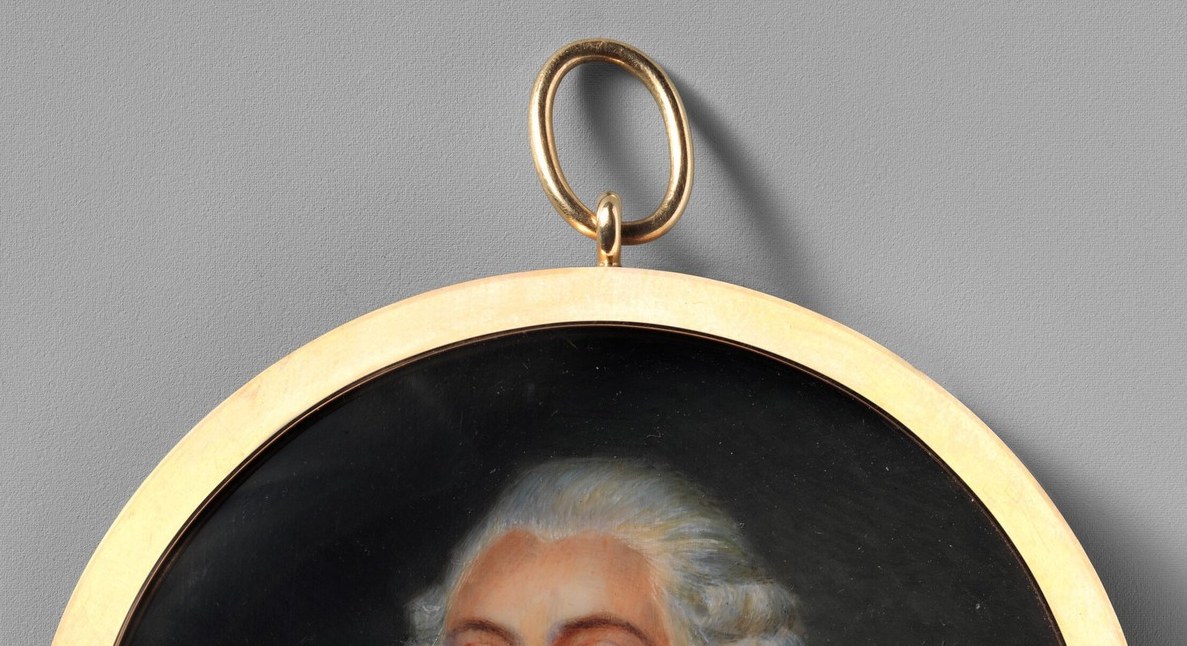 His powdered wig and rich coat speak of absolute power.
