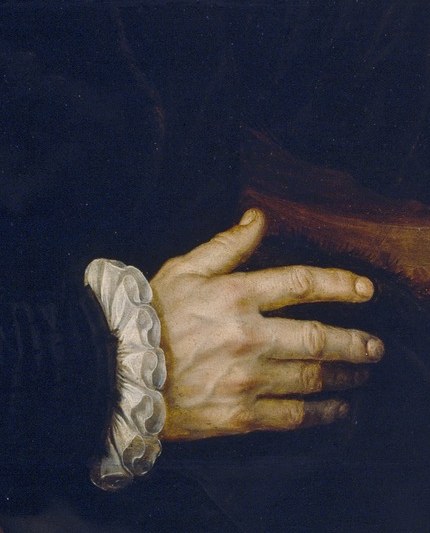 The father’s hand invites us to consider this.
