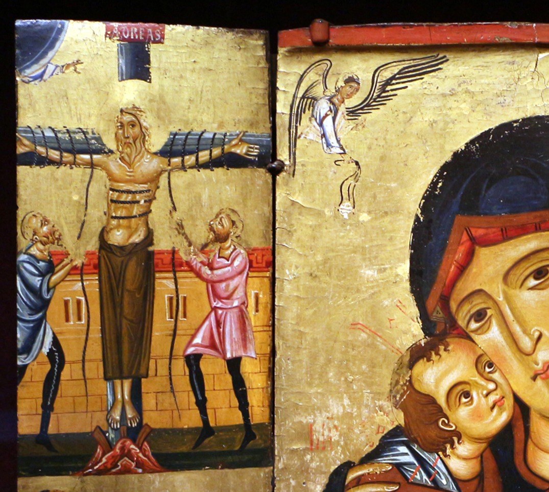 Above them, the Crucifixion reminds viewers of Christ's sacrifice.