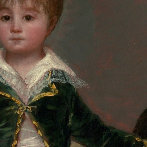 This boy wears a general's gold braid on his shoulder.