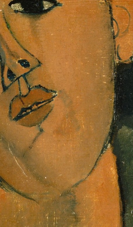 His nose is a sharp, geometric wedge, a signature detail.