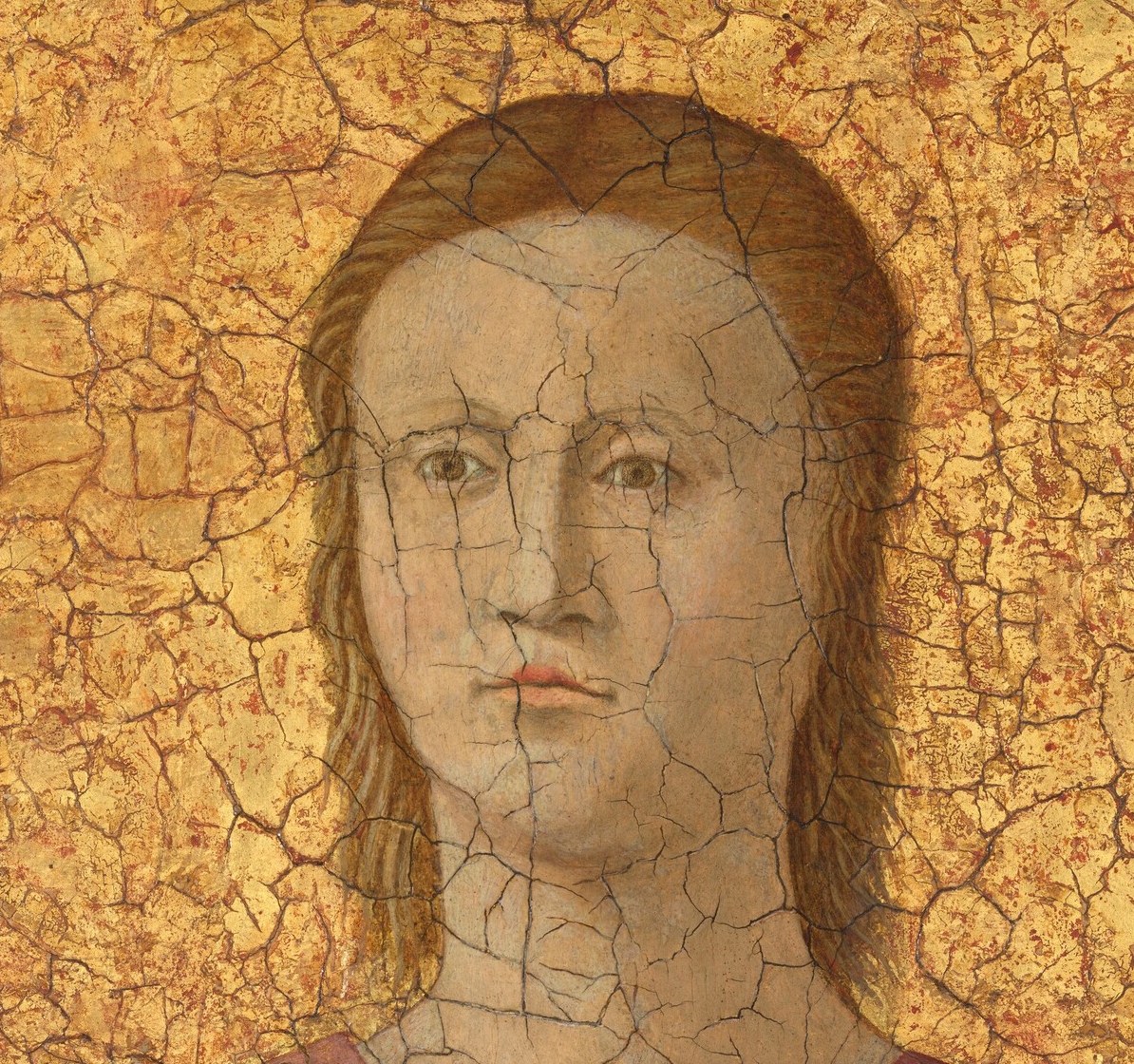 She looks like a quiet Renaissance portrait.