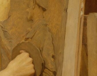 This is the point of creation, where his hand meets the stone.