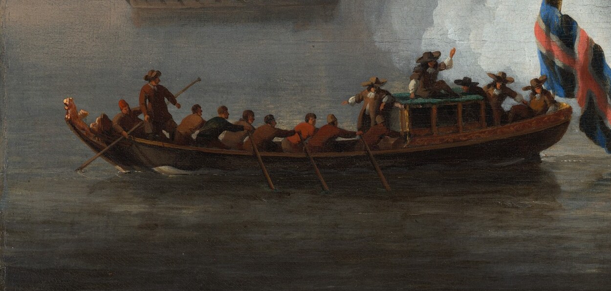 Even a small rowboat, filled with more people, can be seen.