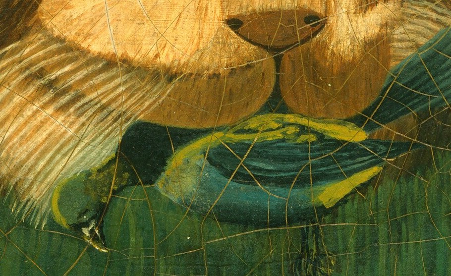 The bird in its mouth is still whole.