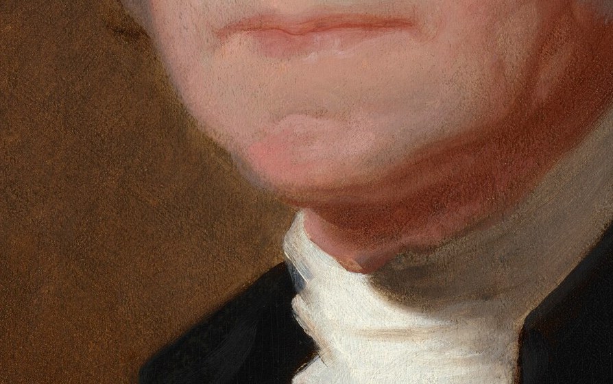 The tightly pressed lips hide ill-fitting dentures.