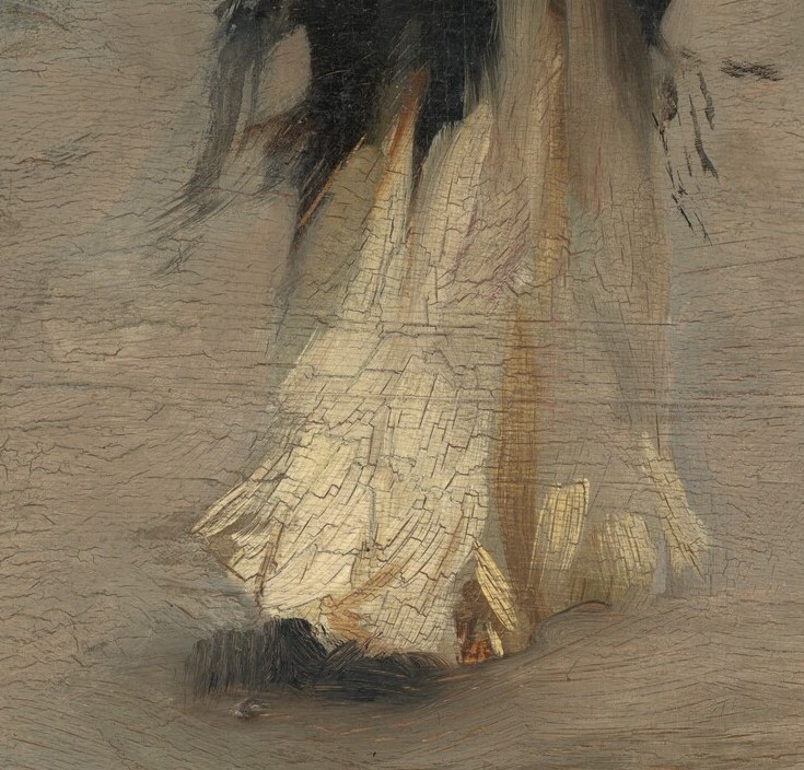 She kicks her skirt forward, moving as fast as she can.