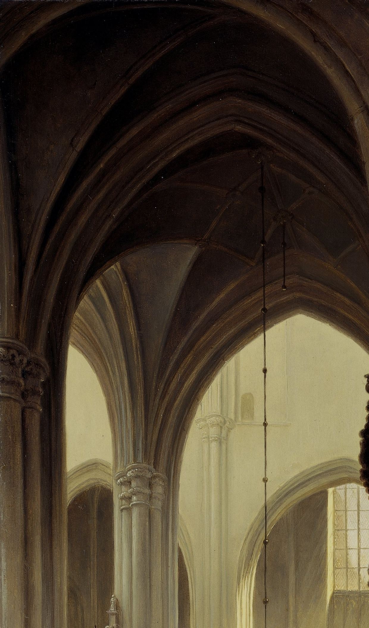 The soaring, shadowed arches create a dramatic sense of scale and architectural beauty, guiding the eye upwards.