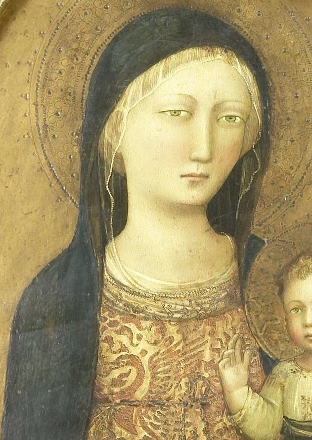 Both halos mark them as divine figures.