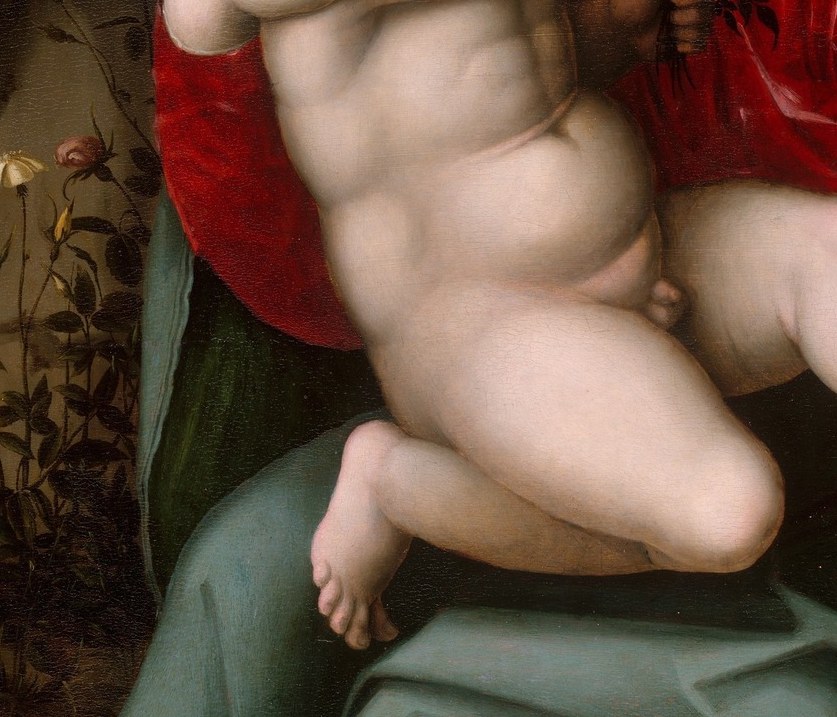 But look at how this woman holds the child.