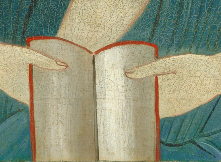 And they sliced the book the sisters hold between them.