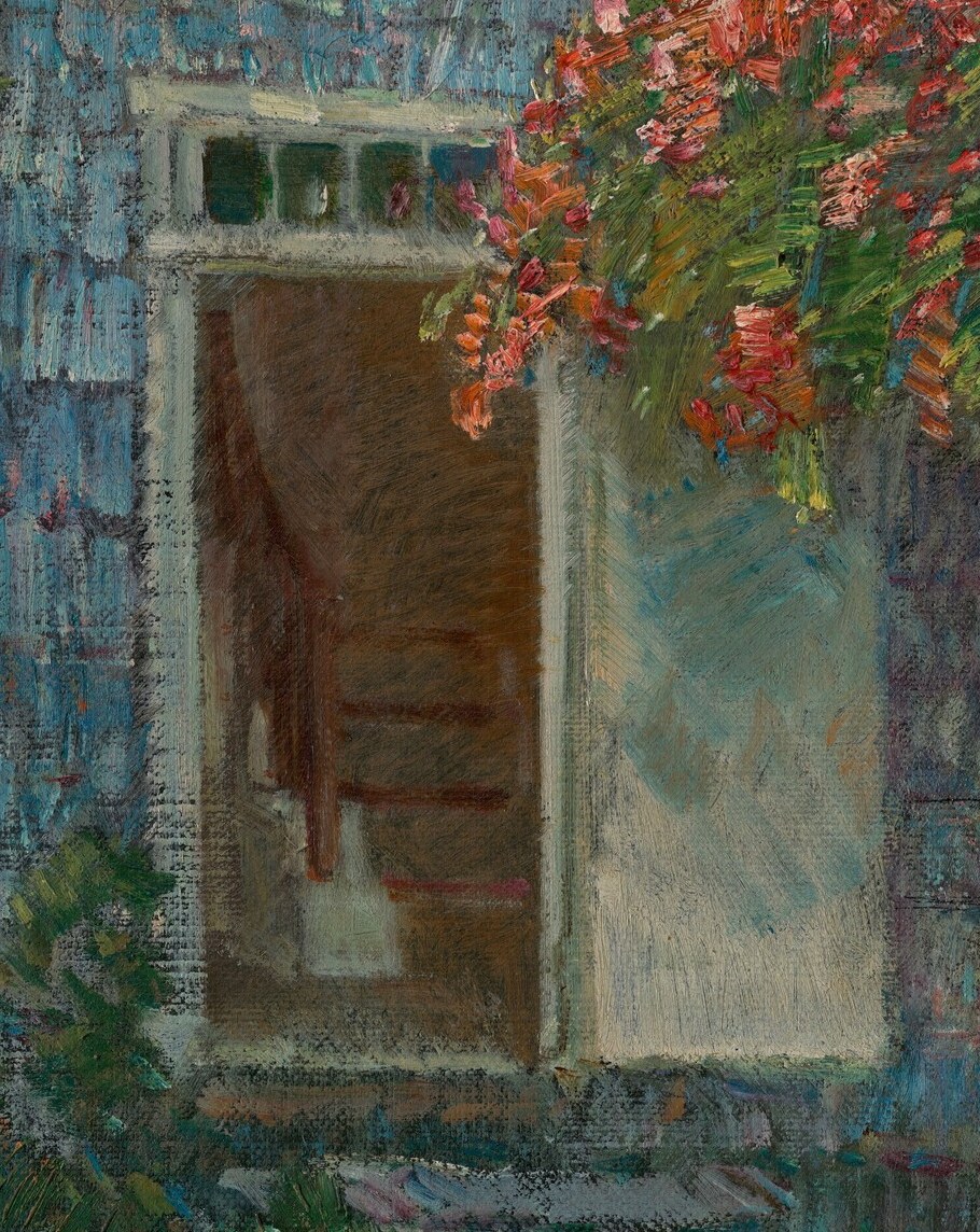 But the real story is not the flowers or the blue shingles.