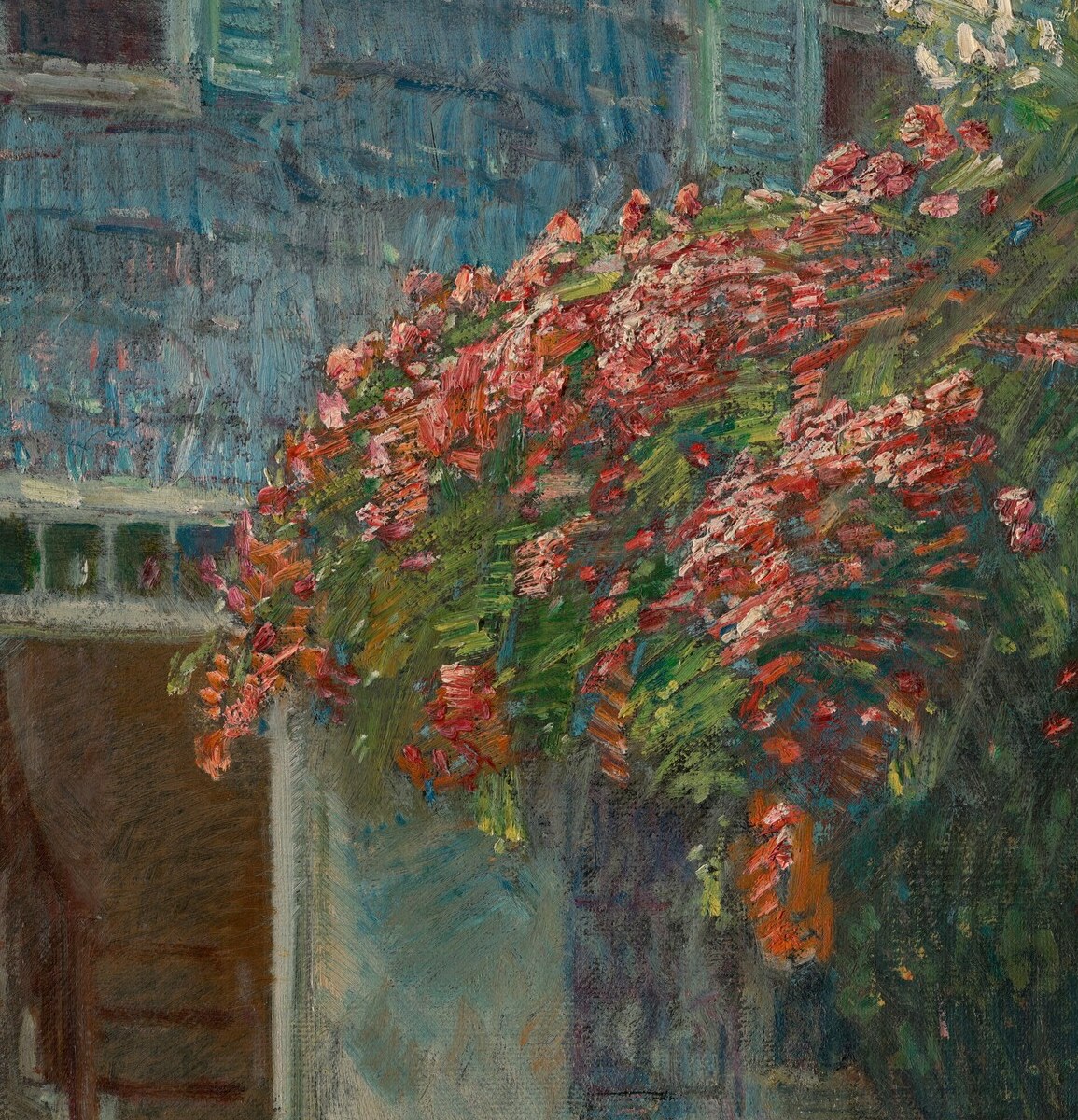 The pink blossoms frame it like an ideal home.