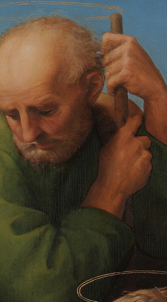 Beside them, Joseph rests on his staff, a protector.